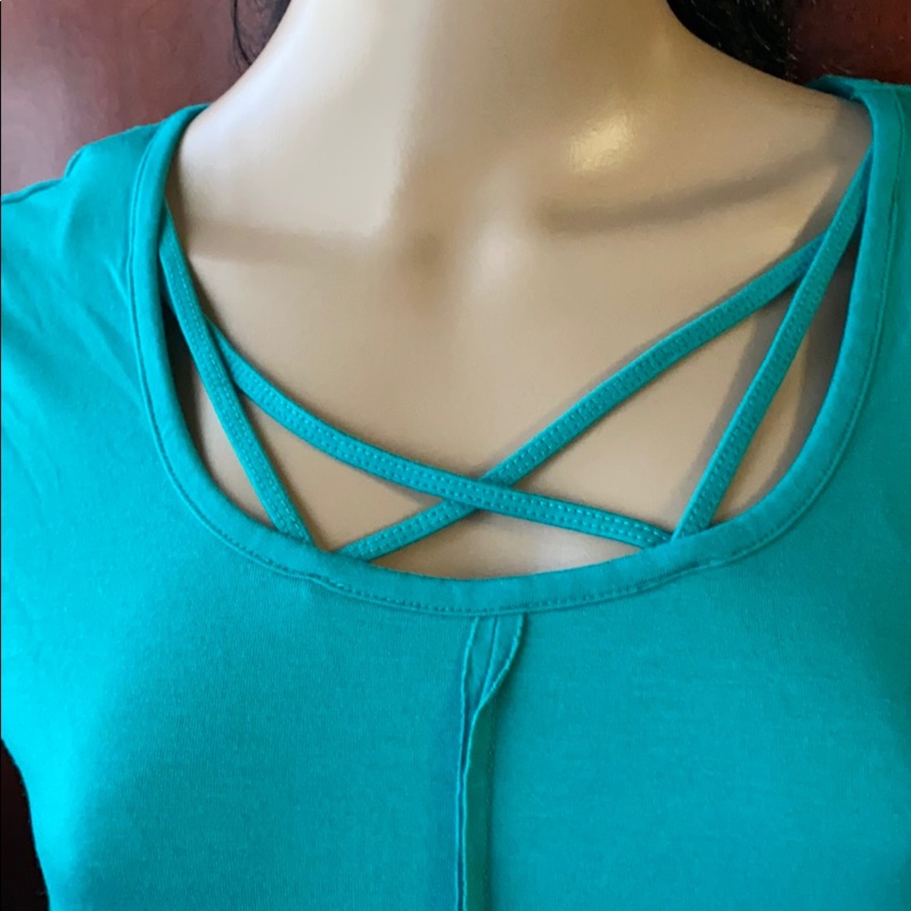 Long crisscross shirt in excellent condition.